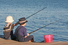 Girl & boy fishing